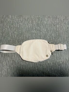 lululemon athletica Ivory Belt Bag with Gold Logo